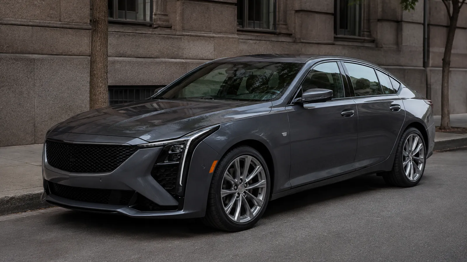 2026 Cadillac CT5 parked at the kerb on a city street, seen from the front three-quarter - Cadillac CT5