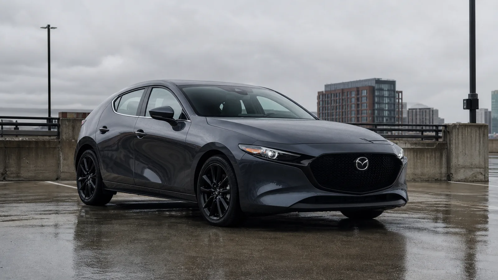 2026 Mazda3 hatchback in a front three-quarter view - Mazda3