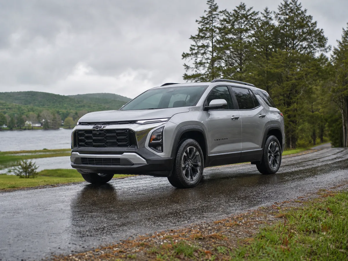 Chevrolet Equinox AWD on a wet sloping road with visible tire tread
