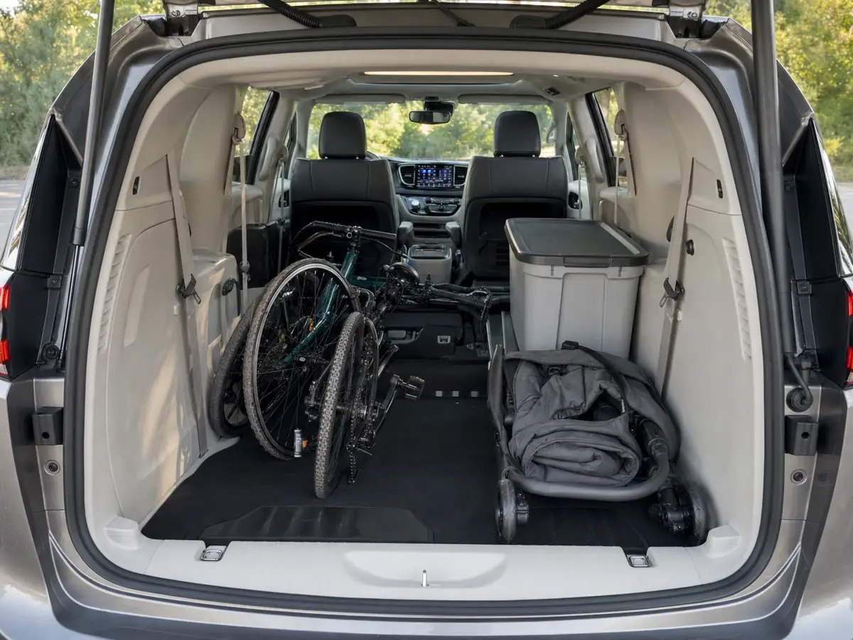 Chrysler Pacifica gas minivan with Stow 'n Go seats folded and family cargo loaded - Chrysler Pacifica