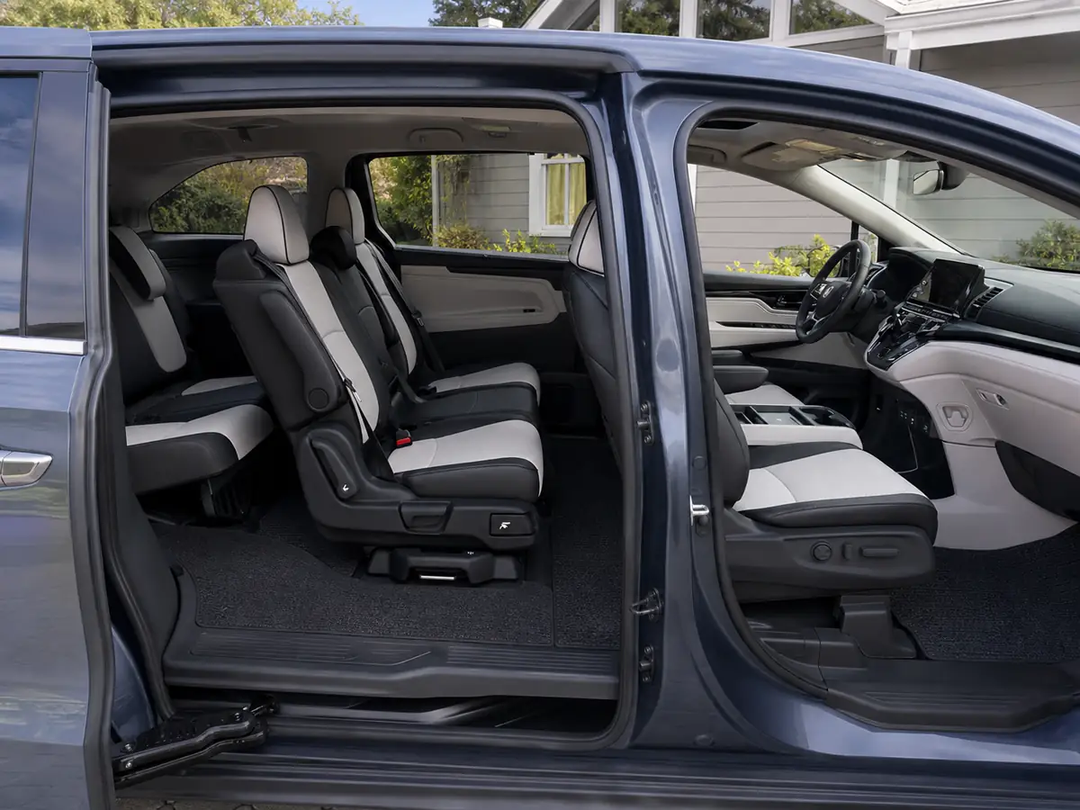 Open sliding-door view of the 2026 Honda Odyssey with all three seating rows upright - Honda Odyssey