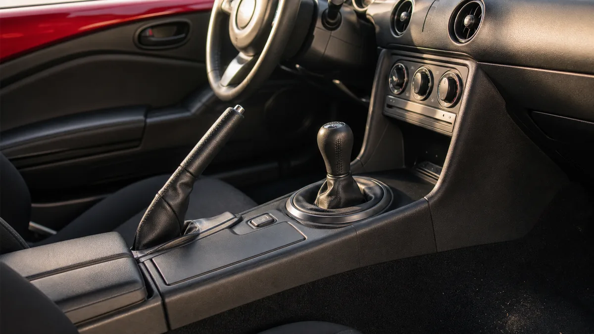 Mazda MX-5 Miata manual controls and driver focus - Mazda MX-5 Miata