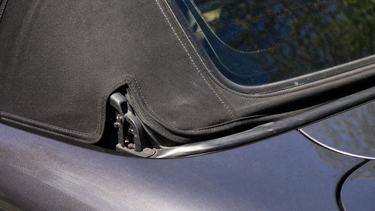Convertible soft top latch and fabric detail