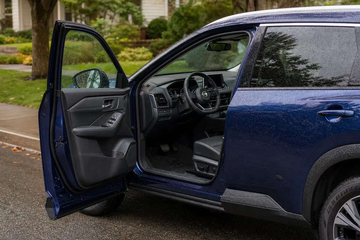 Nissan Rogue driver footwell checked for water after rain
