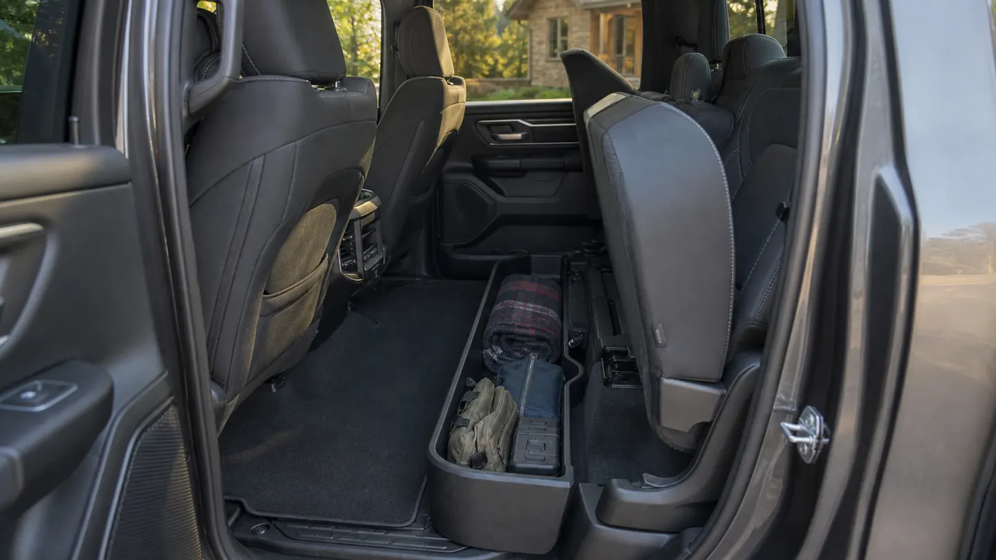 Ram 1500 crew-cab rear interior with the rear glass and floor visible
