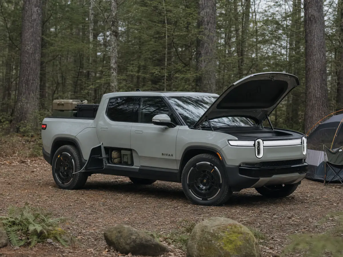 Rivian R1T with Gear Tunnel, front trunk, and bed loaded for a weekend trip - Rivian R1T