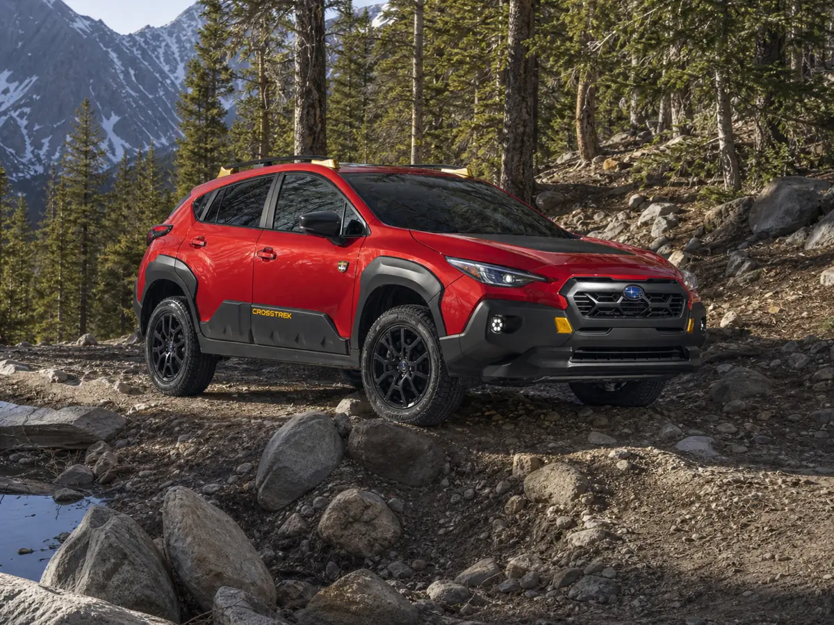 Subaru Crosstrek Wilderness crossing a measured rocky trail obstacle