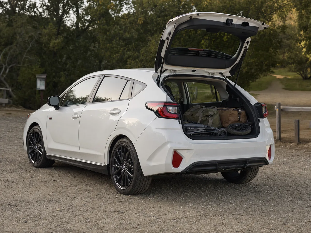 Subaru Impreza hatchback cargo area loaded with daily gear - Subaru Impreza
