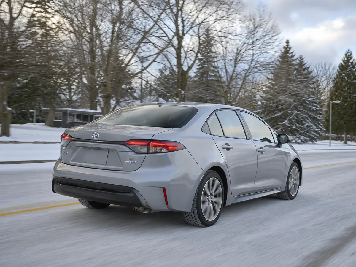 2026 Toyota Corolla Hybrid driving a highway grade with passengers - Toyota Corolla Hybrid