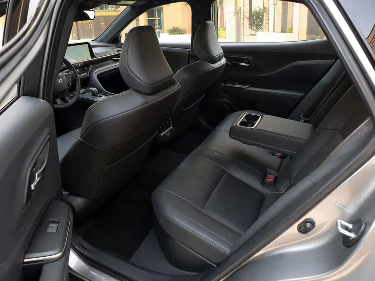 2026 Toyota Crown rear passenger area showing the sloping roof and raised seating position - Toyota Crown