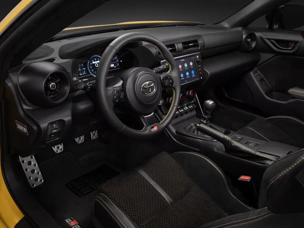 2026 Toyota GR86 cockpit and manual shifter arranged for a driving-position test - Toyota GR86