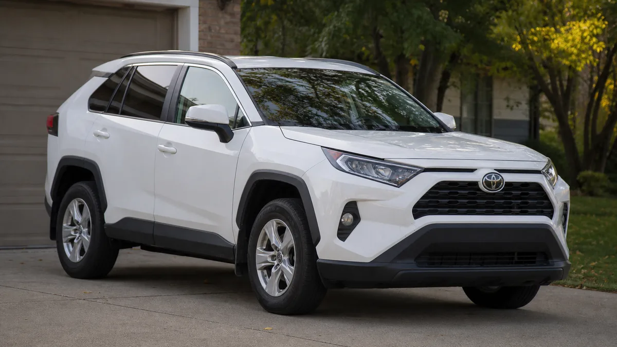 Toyota RAV4 parked in a driveway during an ownership check - Toyota RAV4
