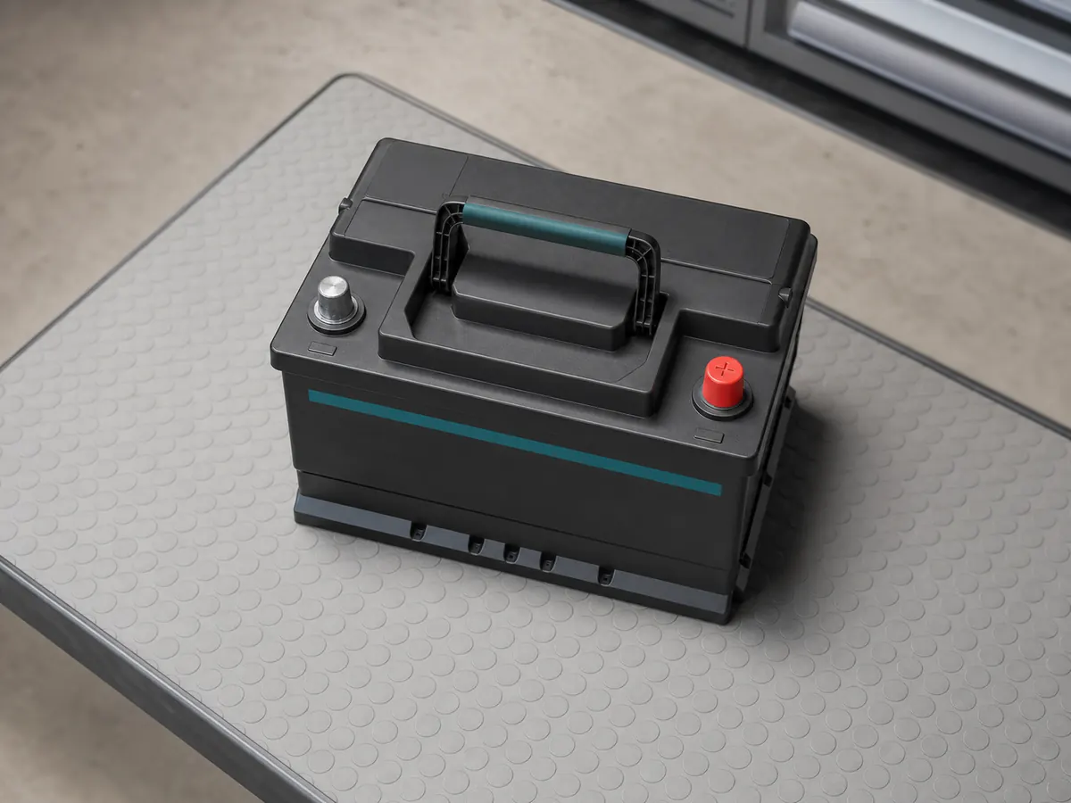 Representative compact H4 flooded automotive battery with top posts